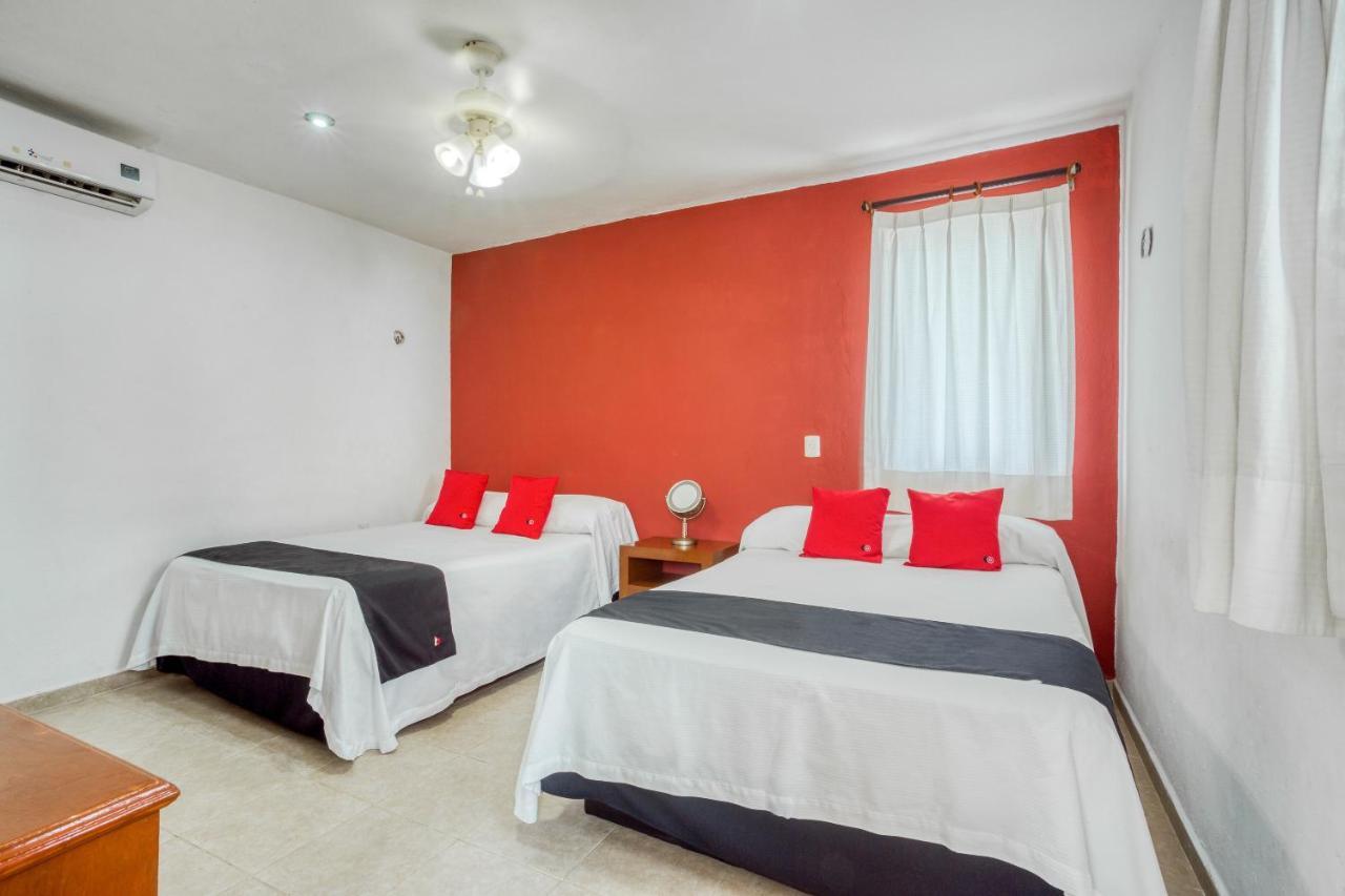 Chac Chi Hotel & Suites อิสลามูเฮเรส ภายนอก รูปภาพ